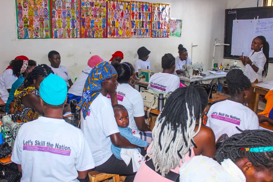 children-learning-to-sew